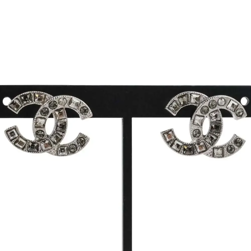 CHANEL Silver Logo Earrings
